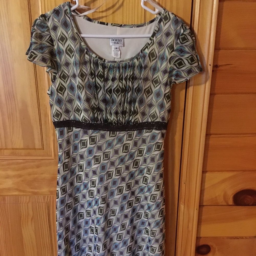 Cute flowy print dress.  Modest w/a sexy neckline.